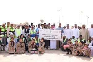 شرطة أبوظبي تشارك في حملة تنظيف مخيم بحيرة الوثبة
